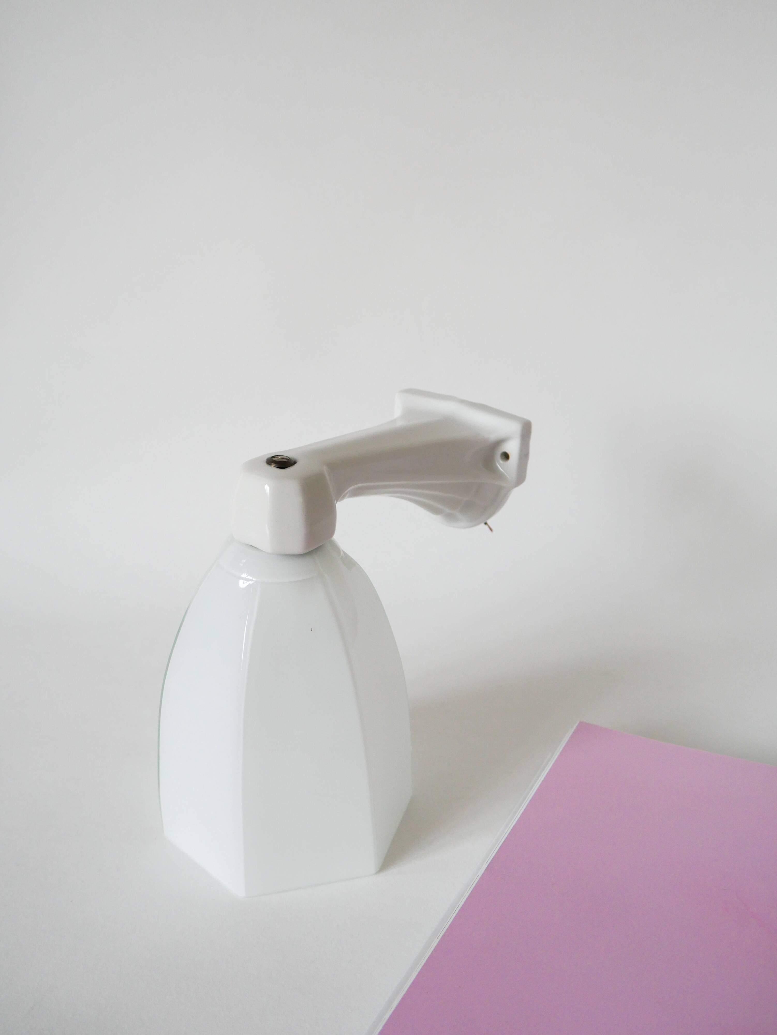 graphic art deco wall light and 20th century porcelain support