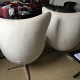 2 white felt egg chairs