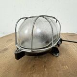 Industrial brown bakelite wall light with frosted glass, 1960s