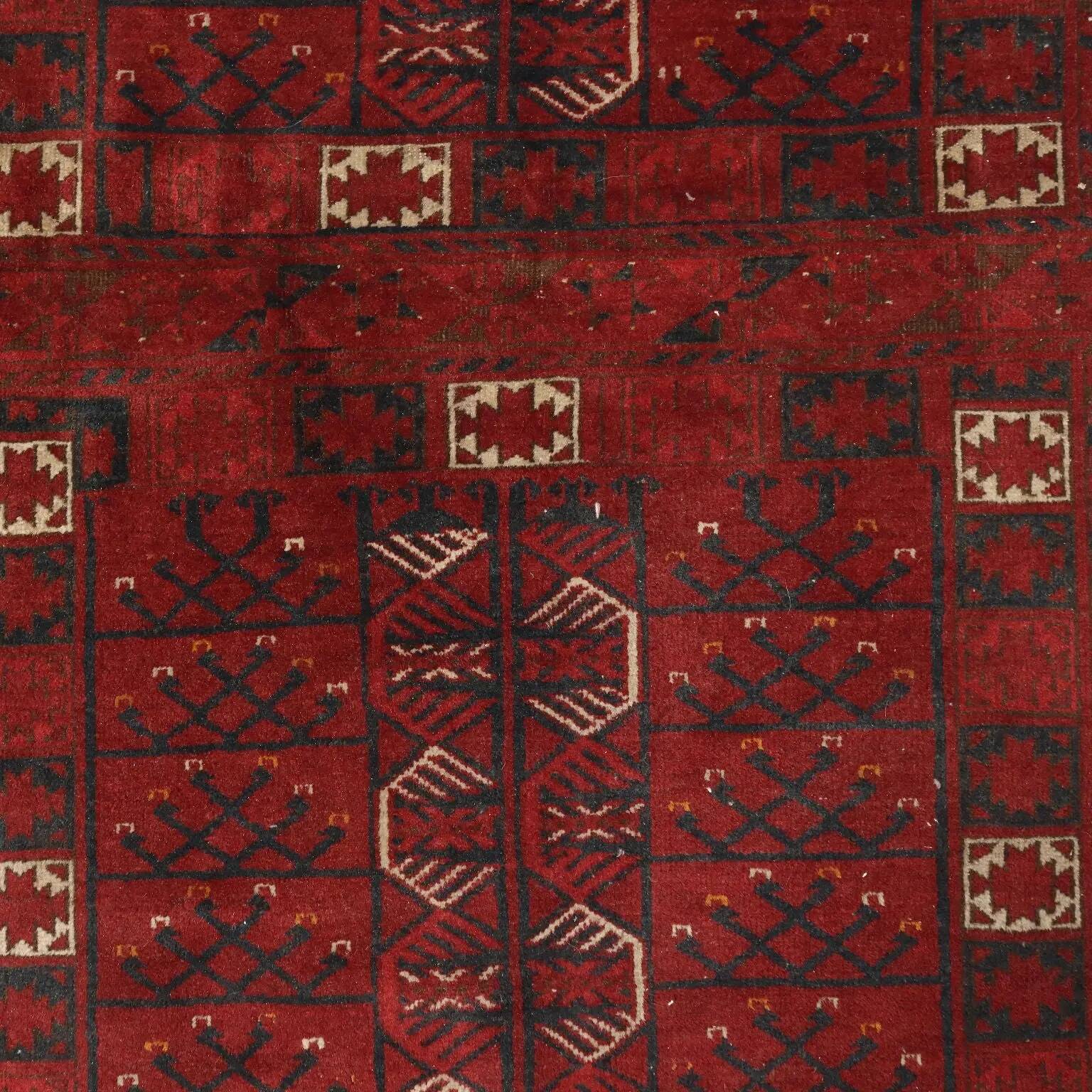 Ancient Asian wool rug, hand-knotted, 82 x 51 in.