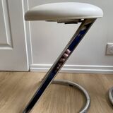 Pair of vintage Z low stools with chrome metal base and white skai seat. H: 49 cm 80s