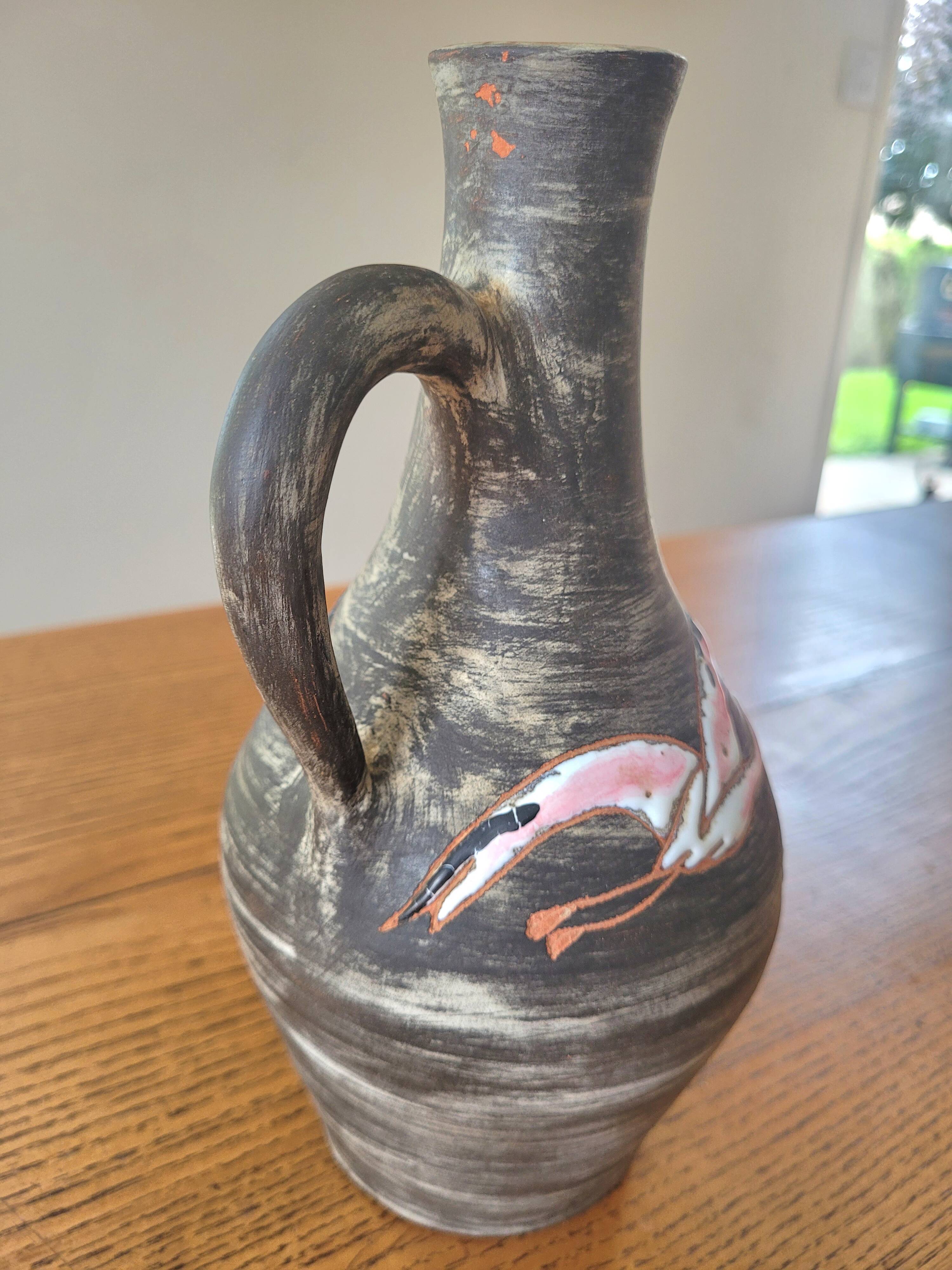 Rare signed ceramic and enameled porcelain pitcher