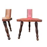 Pair of vintage French three-legged chairs with Breton style backrest, wooden seat 1960s
