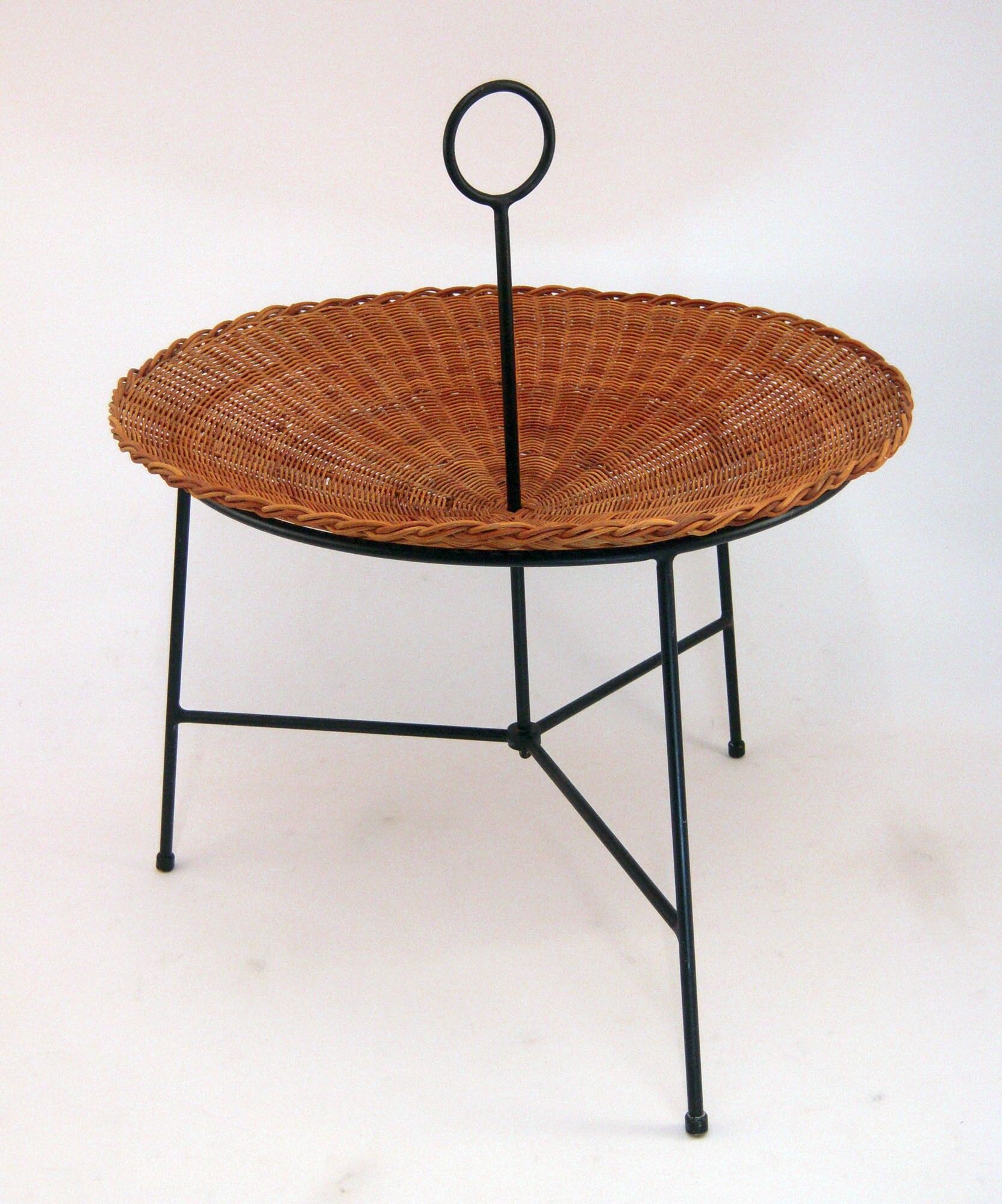 Wicker and black lacquered brass magazine rack 1960