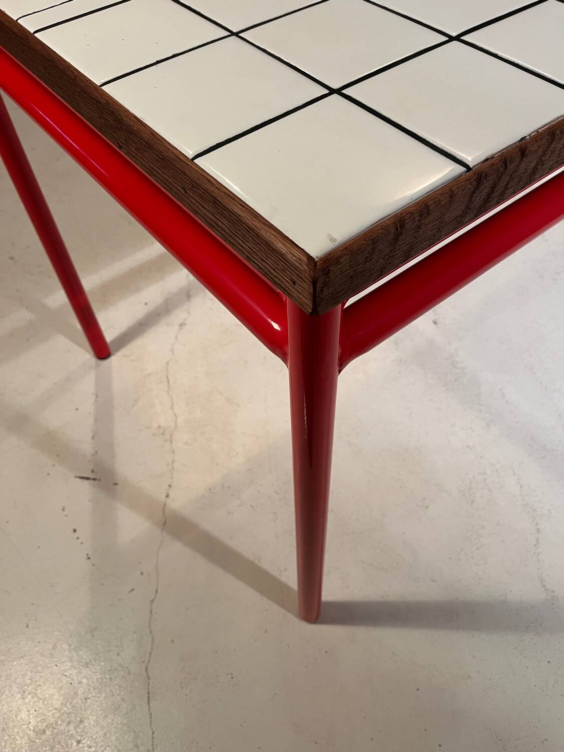 Custom modernist table, steel and earthenware.