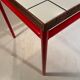 Custom modernist table, steel and earthenware.