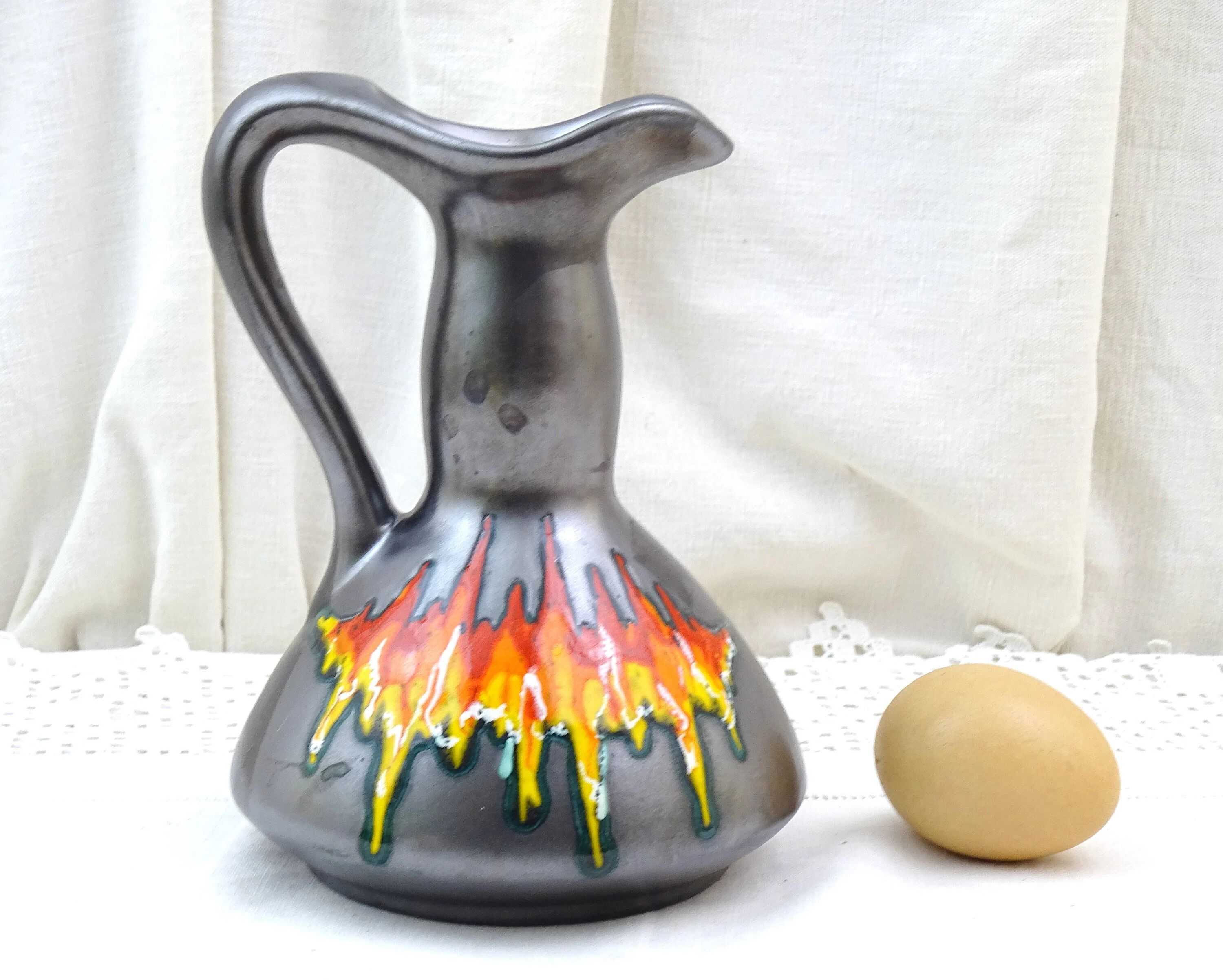 Vintage Italian mid-century iridescent black pottery vase/pitcher with red flame glaze, retro 1950s ceramic ornamental pitcher from Italy