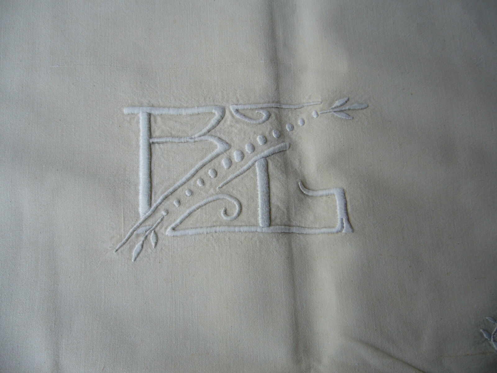 Old linen sheets embroidered with flowers