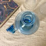 Antique carafe in blue glass