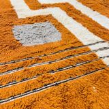 Modern Moroccan rug in rust wool with cream lines 150/250 cm