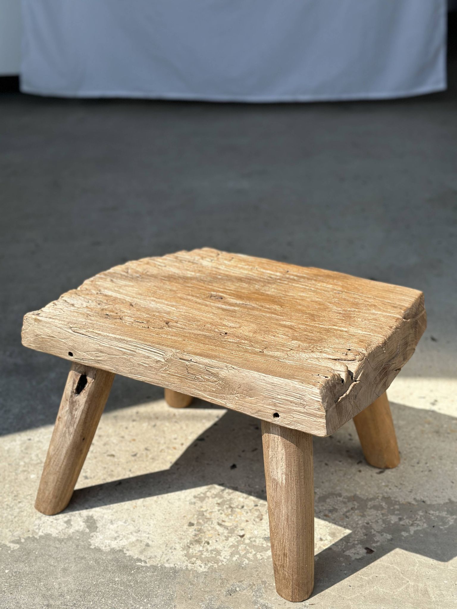 Small side table or stool in four-legged blond teak H:30 L43 l30