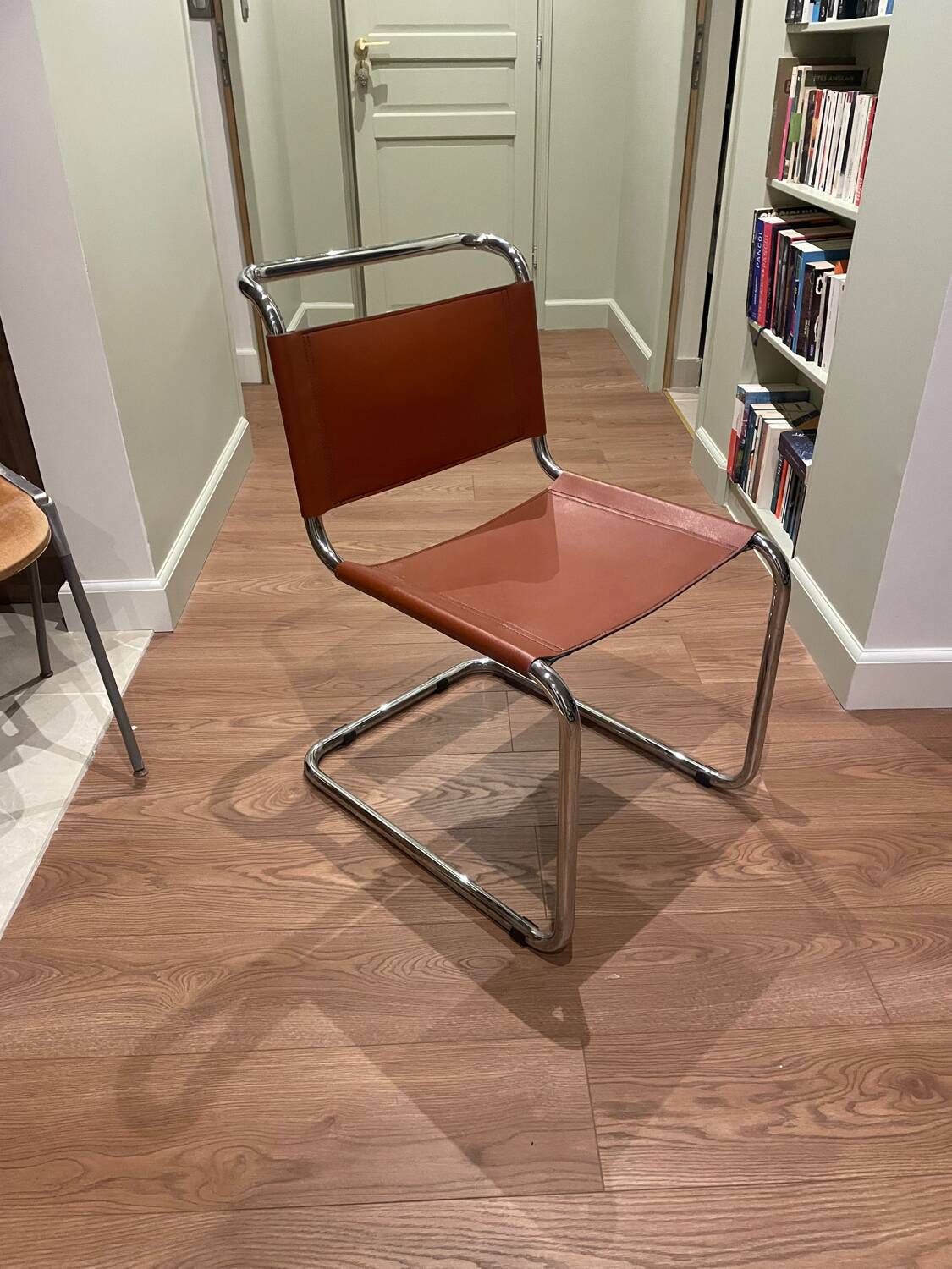 Hanging chair in Mart Stam S33 style in chrome metal and cognac imitation leather