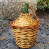 Small bottle style dame Jeanne and its wicker