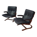 2 x Scandinavian black leather lounge chairs