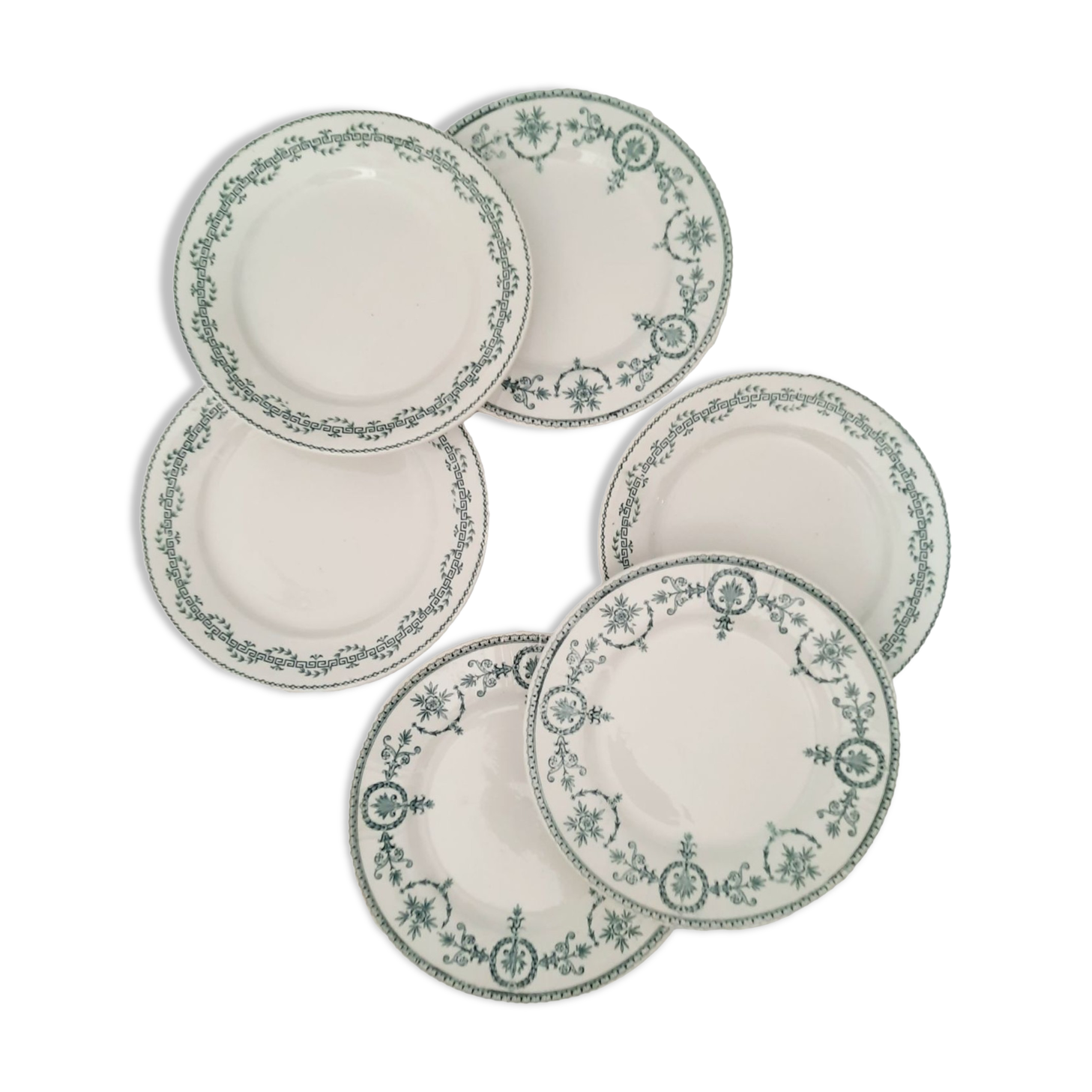 Old dessert plates mismatched in iron earth