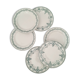 Old dessert plates mismatched in iron earth