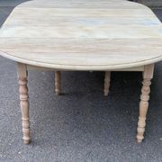 Renovated Louis Philippe round extendable dining table with flaps and 3 extensions.