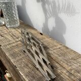 Stretch trivets in silver metal, geometric shapes