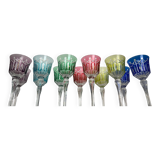 Set of twelve glasses in crystal tinted in different colours and cut with stars.