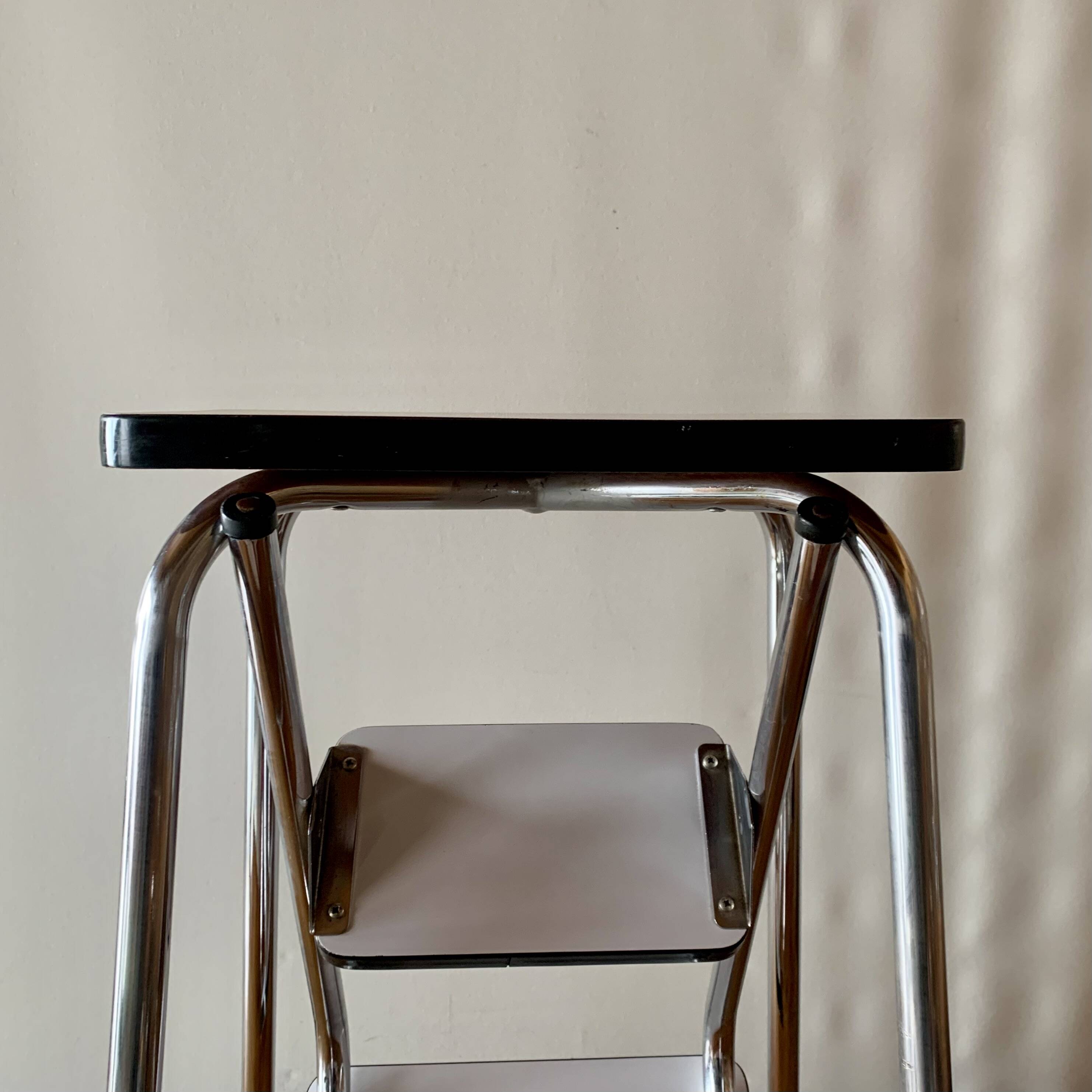 Vintage step stool in white formica and chrome steel