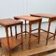 Set of 3 rustic cherry wood nesting coffee tables from the 1950s.