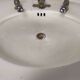 Porcelain sink basin on pedestal
