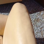Pair of 1930s club armchairs in ivory leather.