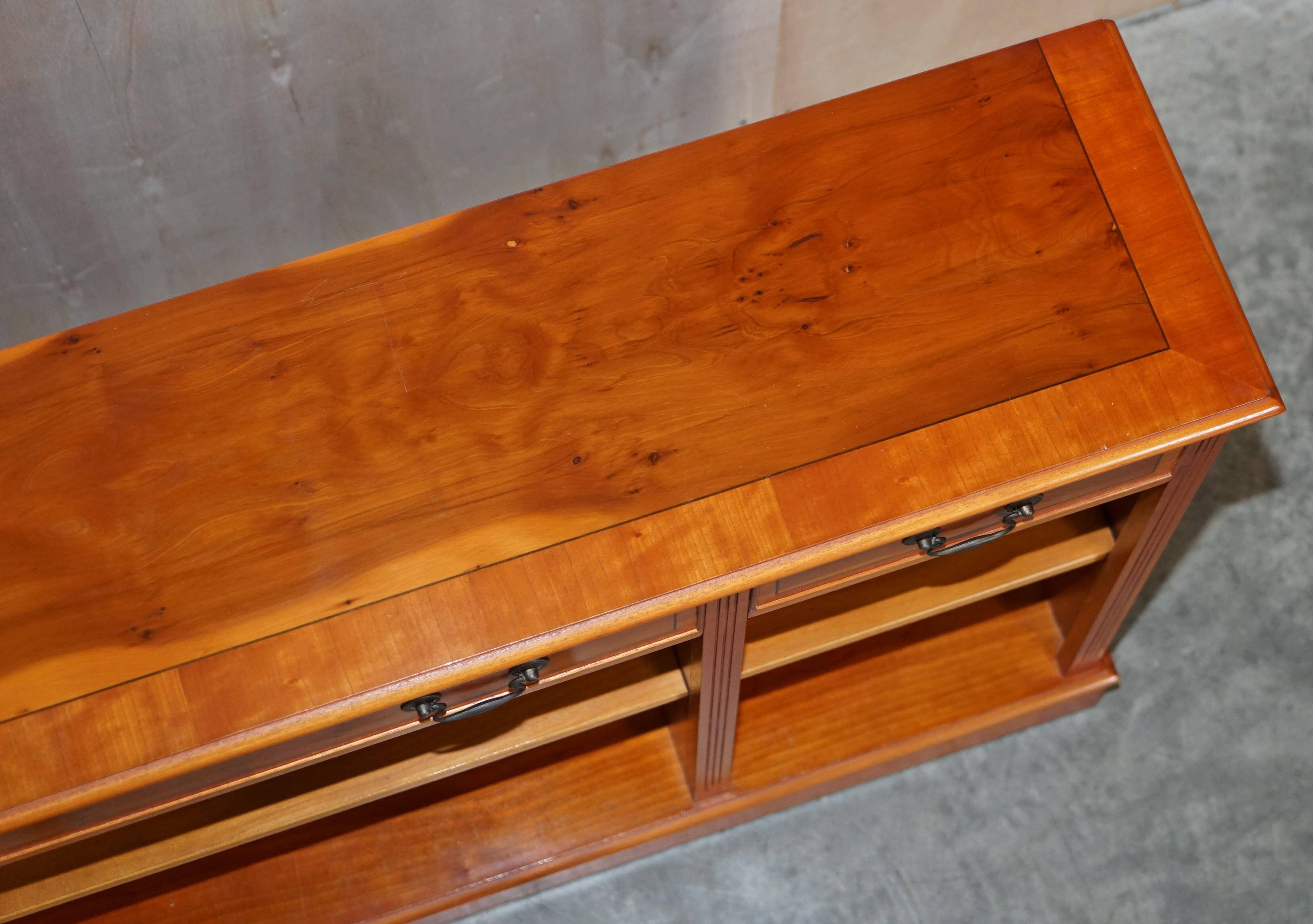 Vintage yew wood library/buffet with three drawers.