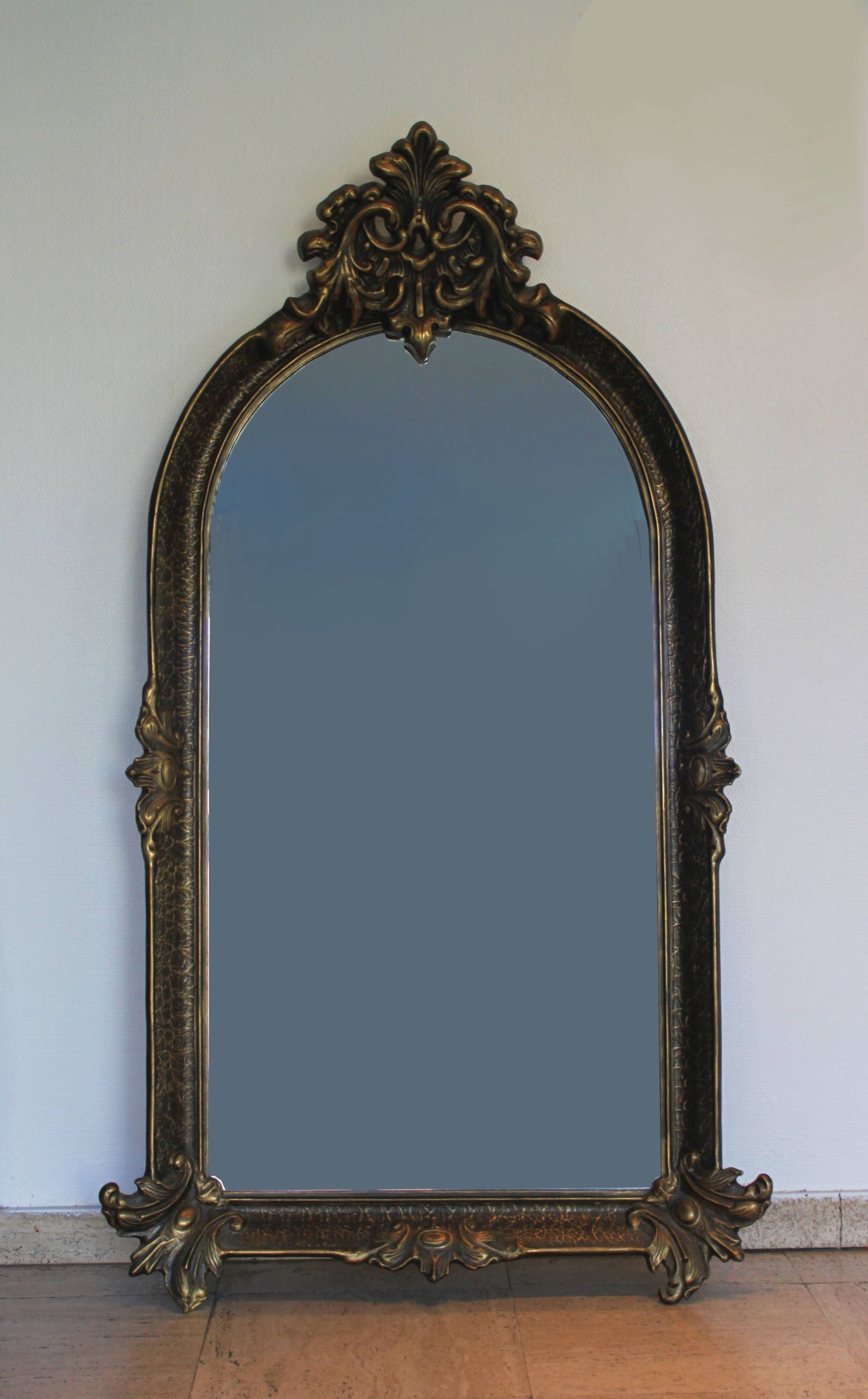 Baroque “trumeaux” mirror in carved solid wood.