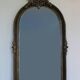 Baroque “trumeaux” mirror in carved solid wood.