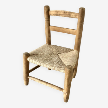 Wooden children's chair and straw seat