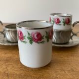 2 small porcelain cups and their pewter cup holders