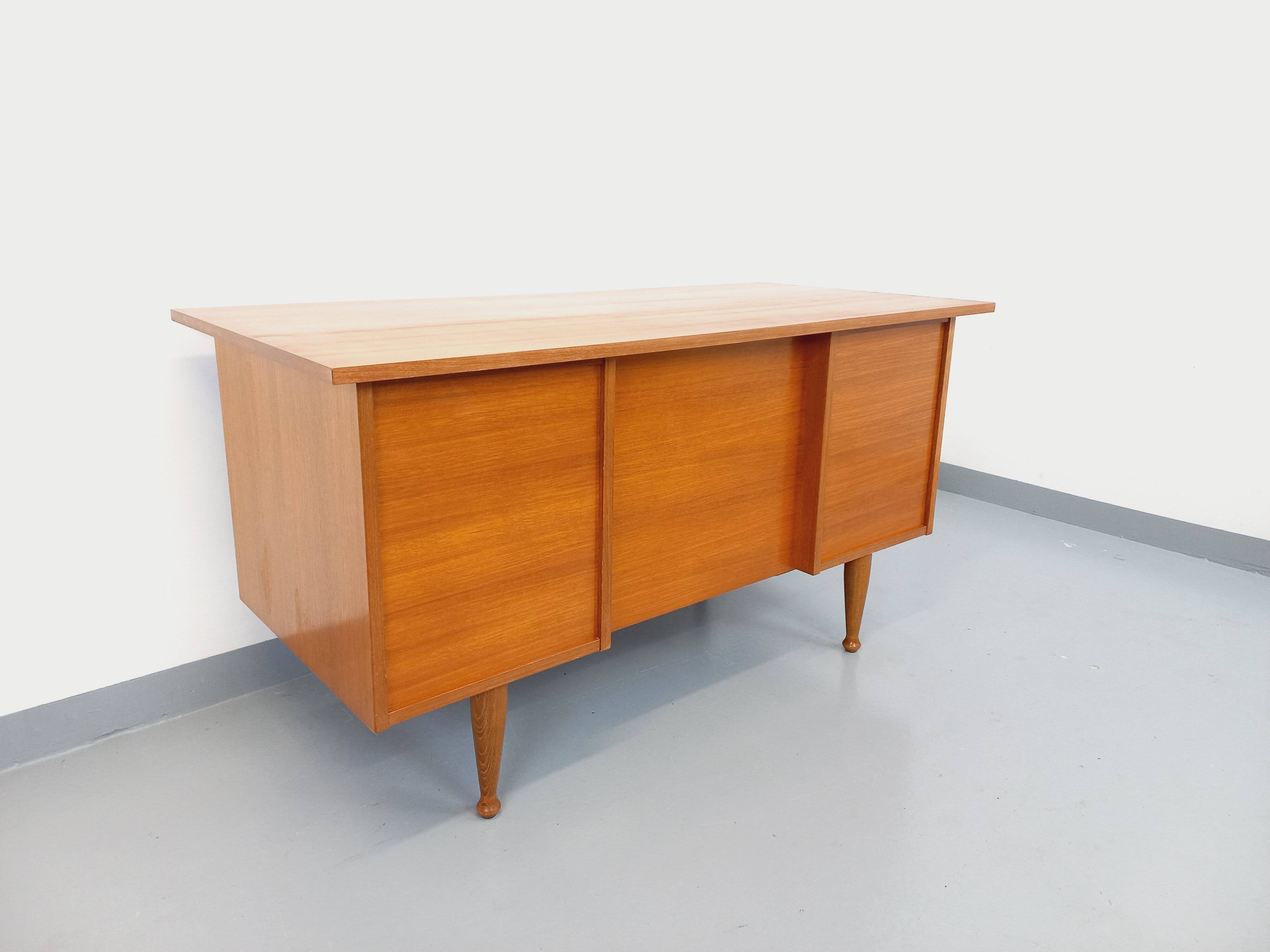 Vintage Scandinavian style executive desk in teak from the 60s