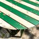 Table de jardin pliante en bois vert et beige ⌀ 95 cm