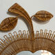 Rattan mirror in the shape of an apple from the 1960s Italy.