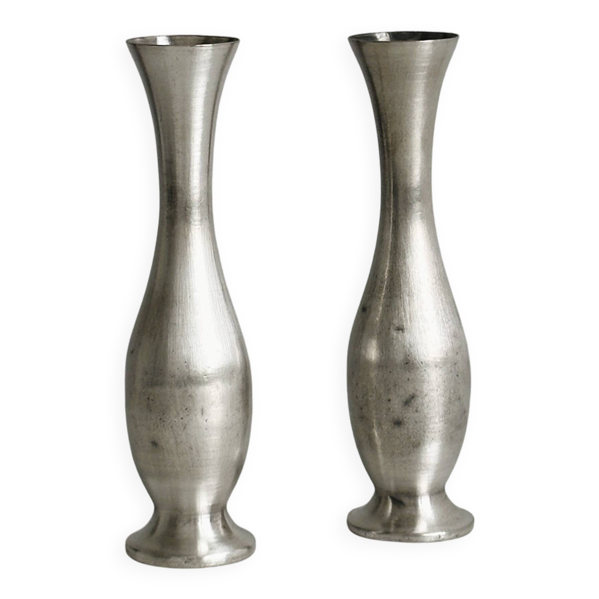 2 shiny metal vases