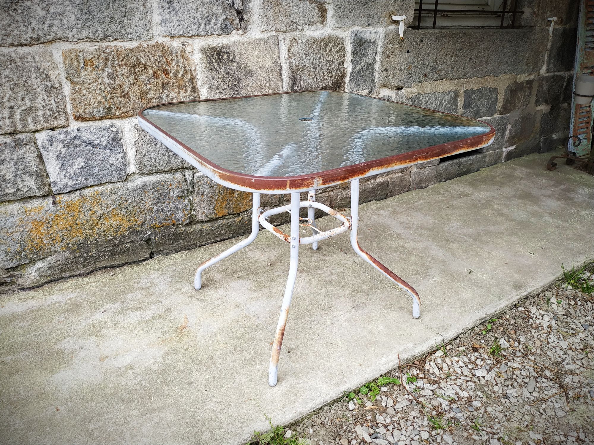 Old garden pedestal table