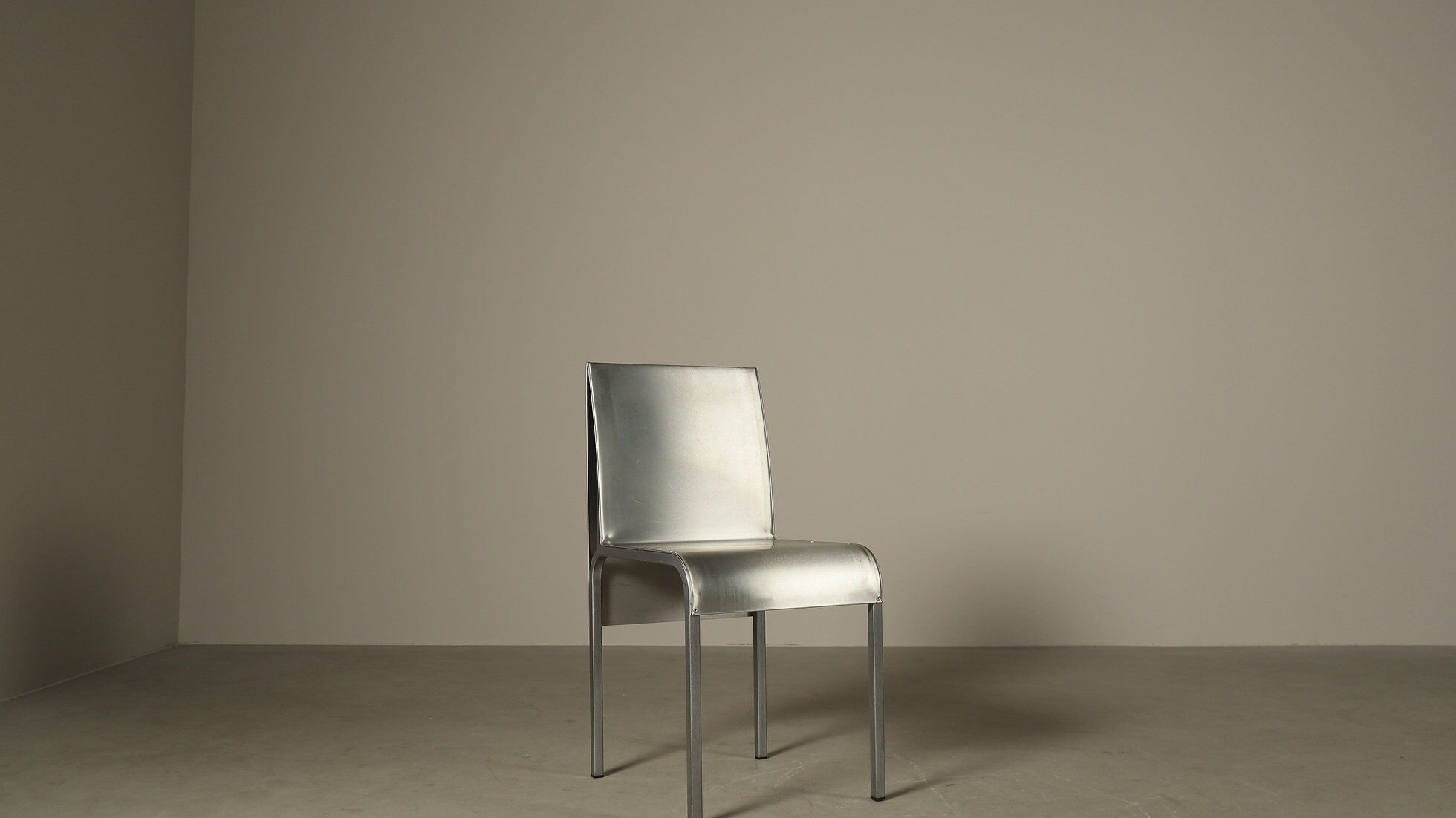 Set of six postmodernist stainless steel dining chairs from circa 1980-1990.