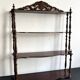 Large Napoleon III shelf in turned wood with a pediment.