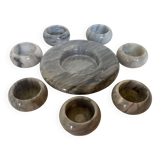 Eight grey-white marble candlesticks