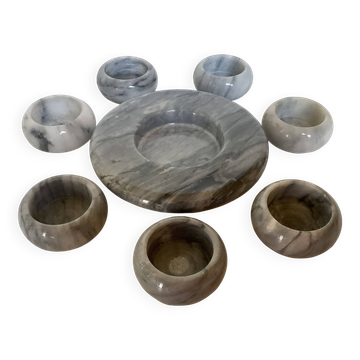 Eight grey-white marble candlesticks