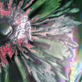 Green faience bowl decorated with multicolored drips around 1970