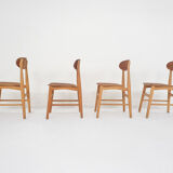Ensemble de quatre chaises en contreplaqué en teck, Pays-Bas 1950