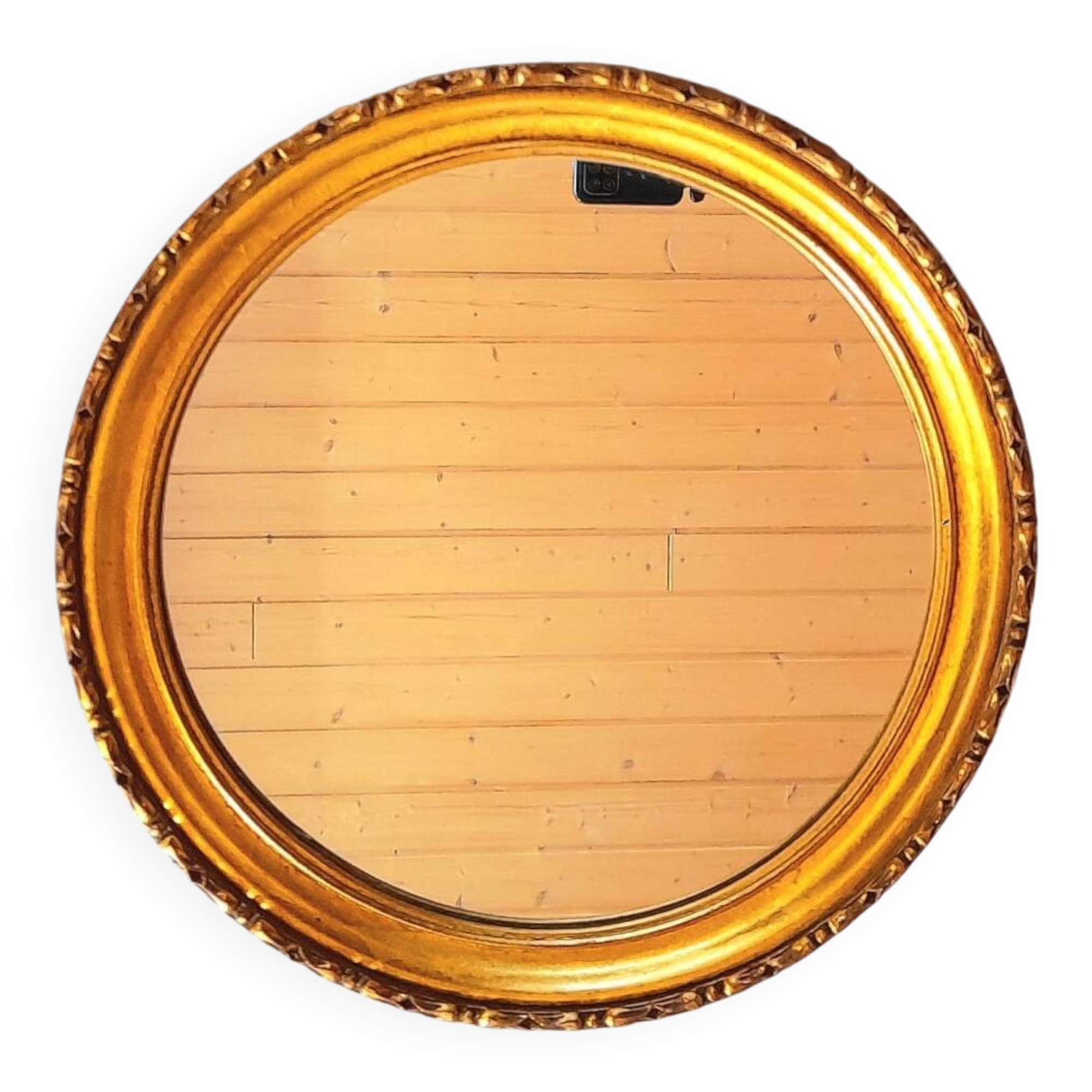 Round golden mirror