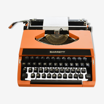 Machine à écrire orange fonctionnelle