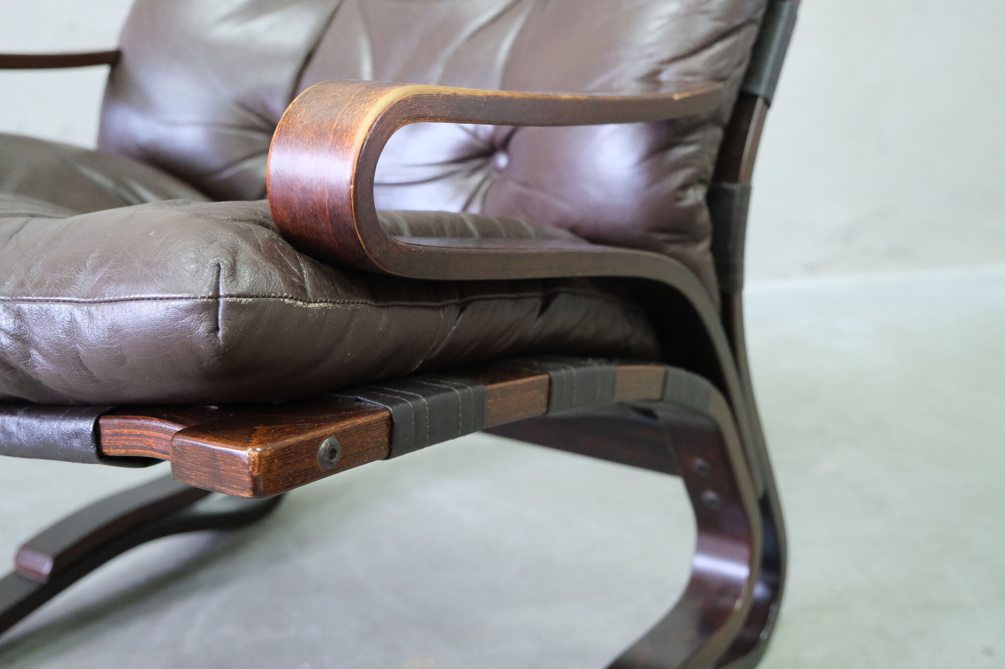 Mid century leather armchair and foot stool by Erda & Nordahl Solheim, Norway 1970's