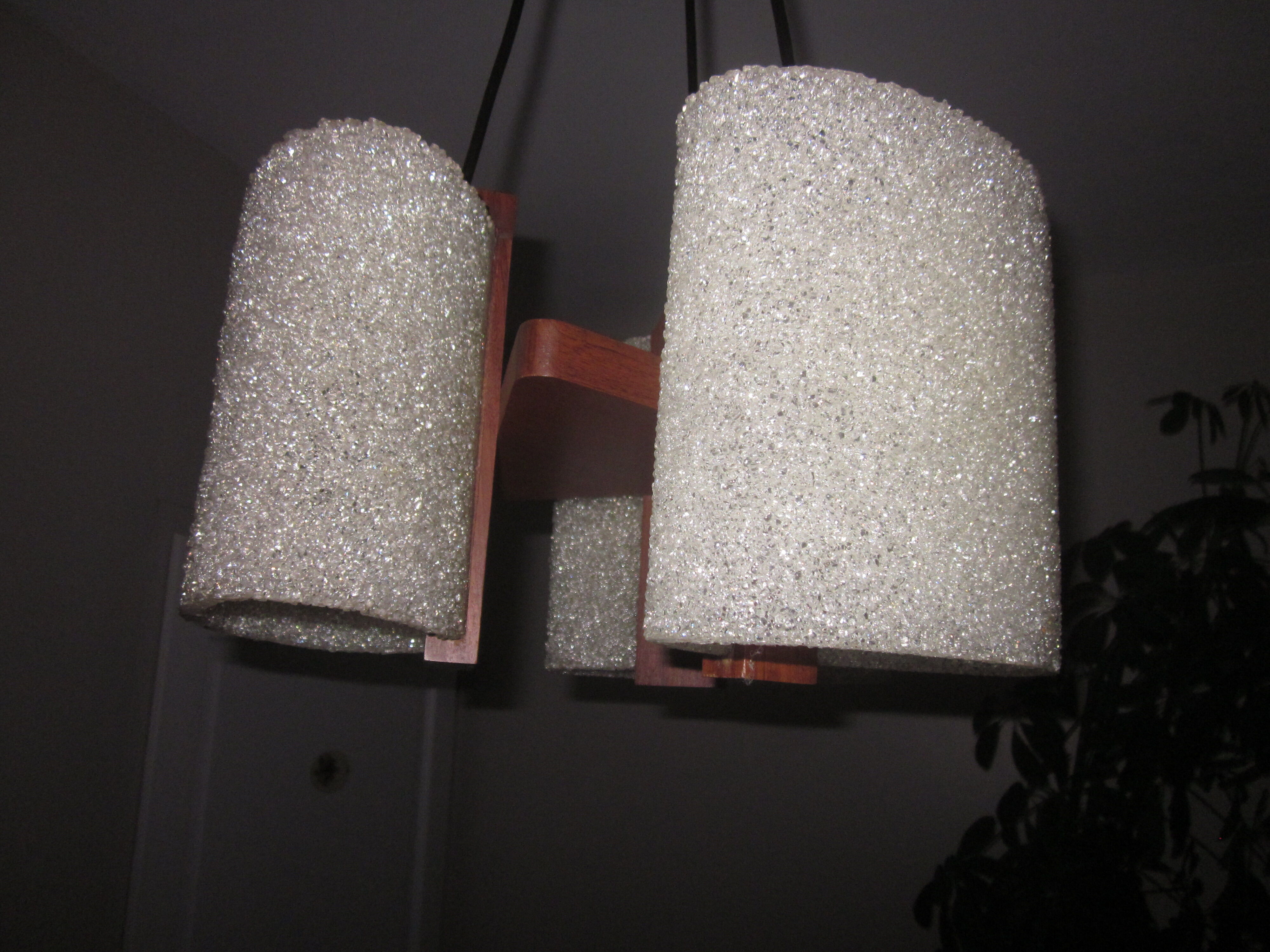 Scandinavian teak chandelier and perplexed