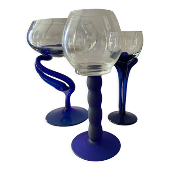 Trio of vintage candle holders in glass and blue glass paste