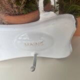 Enamelled sheet metal with inscriptions and hooks
