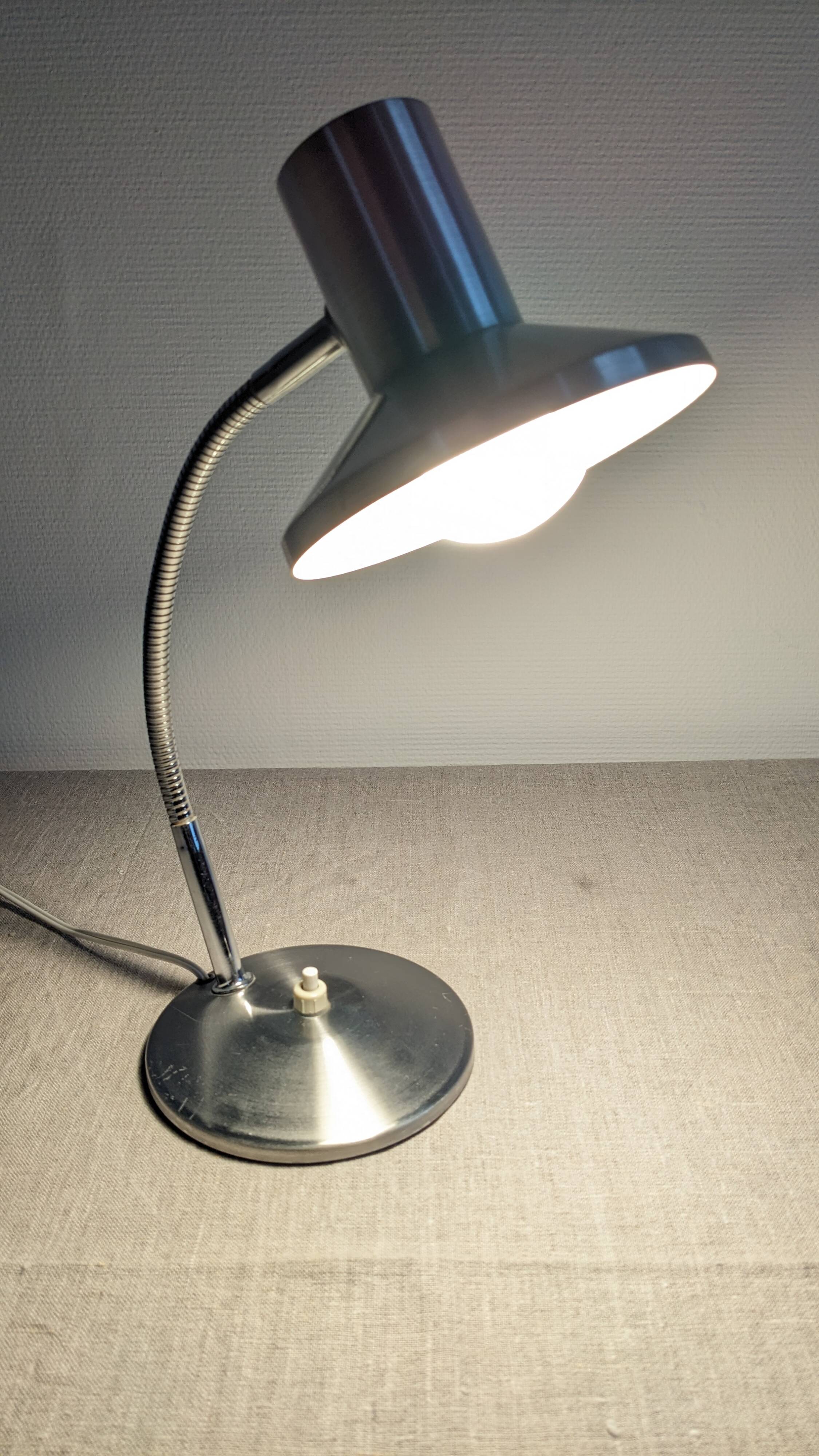 Articulated bedside lamp or wall light, France circa 1960.
